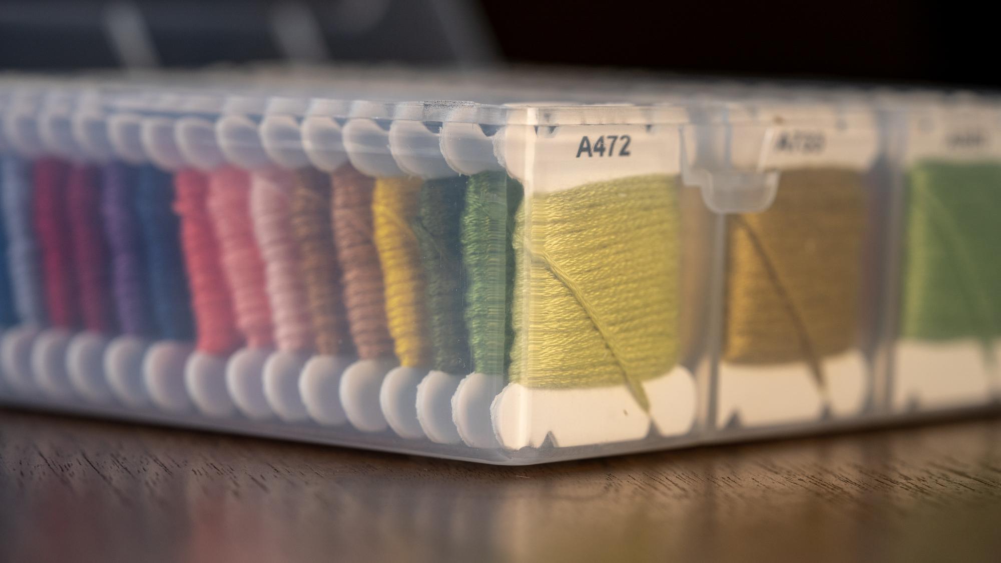 detail of stitches and thread palette